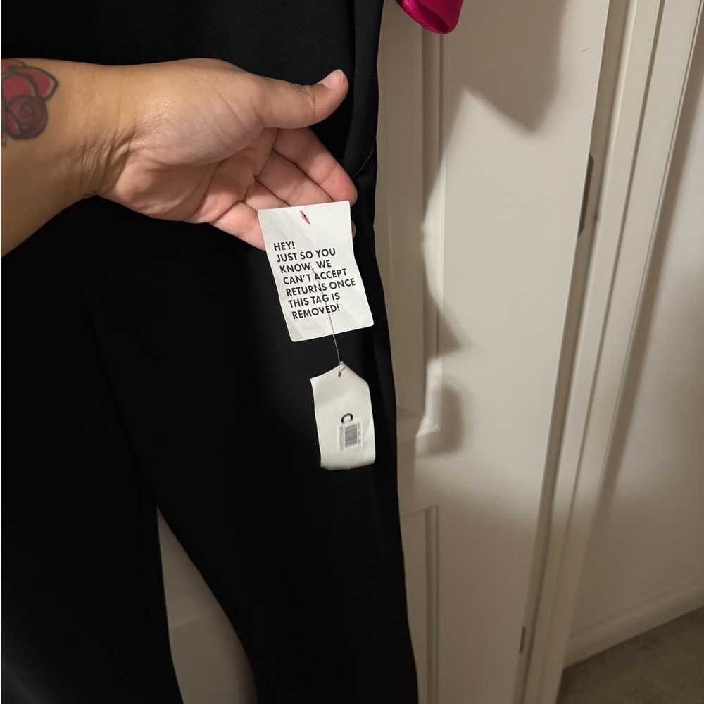 Black Jumpsuit with Fuchsia Bow Back - Picture 6 of 7